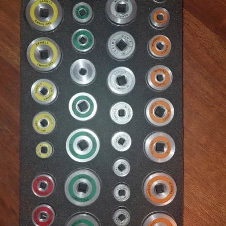 Daniels (DMC) adaptor tools, designed for use with electrical connectors.